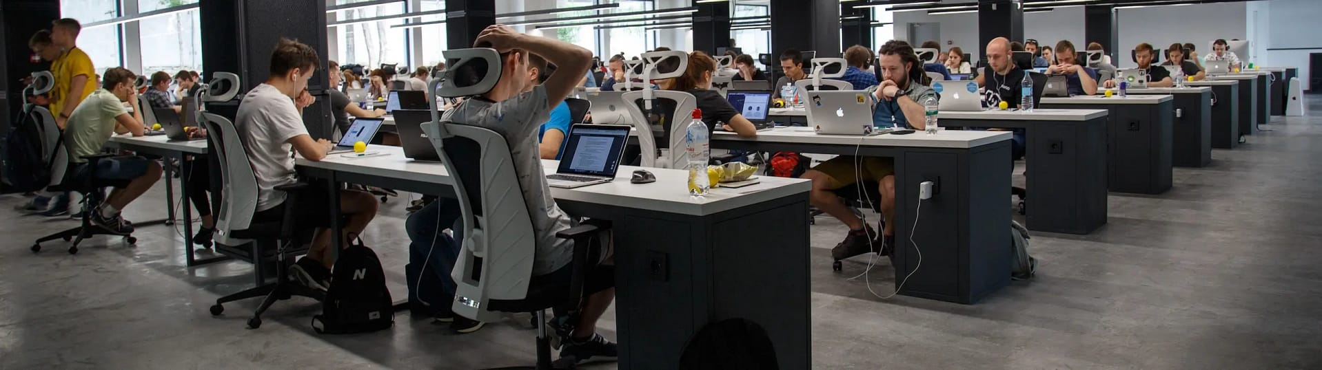 a large office with a lot of staff a large office with a lot of staff